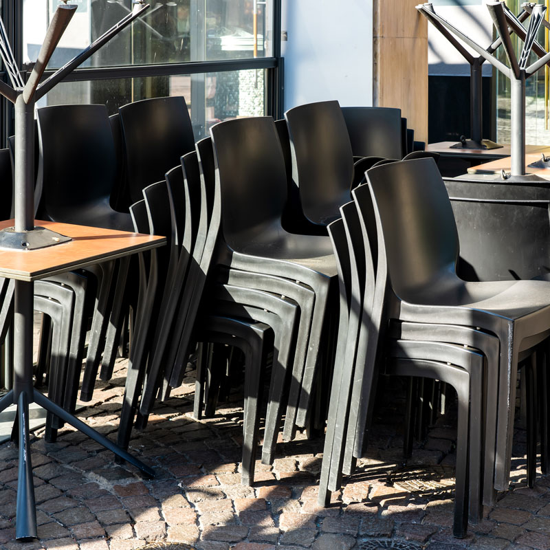 stacked chairs and tables
